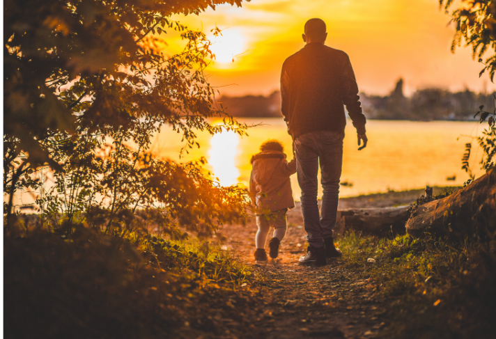 Man with child feeling hopeful<br />
