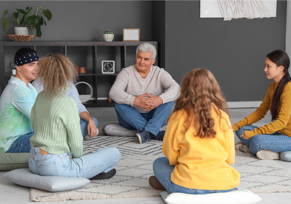 Community group taking part in a guided wellbeing session